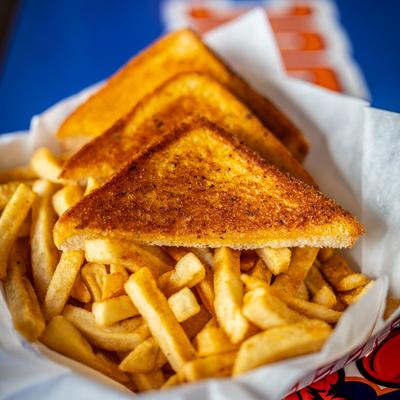 Mixed shrimp family meal with fries.