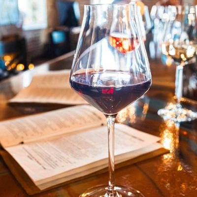 A glass of red wine.