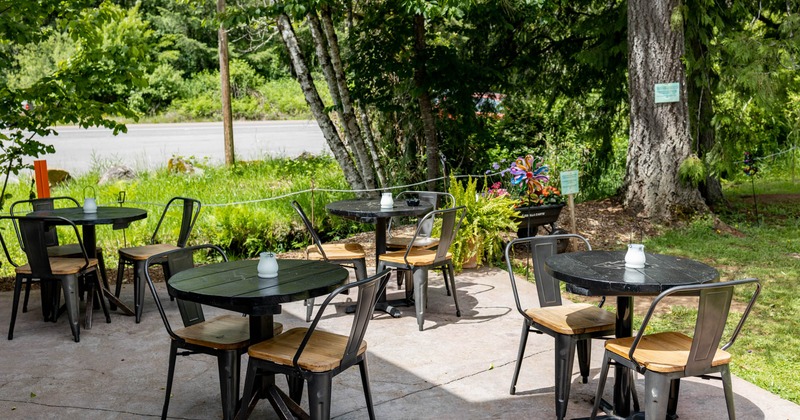 Outdoor, tables with chairs waiting for the guests