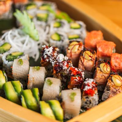 A close up of sushi boat.
