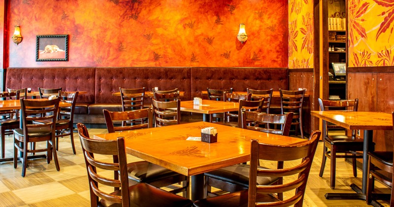 Interior, tables and chairs ready for guests