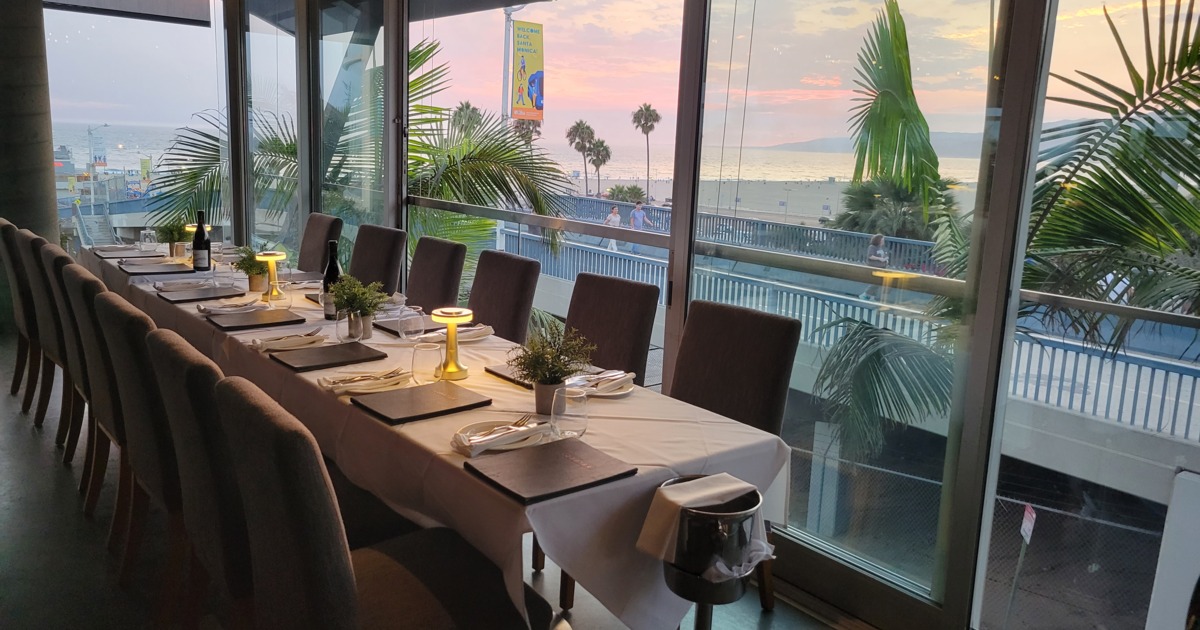 Our Malibu window faces the Palisades Park and looks up the Malibu Coastline.  We can seat 20 comfortably, 22 if needed.