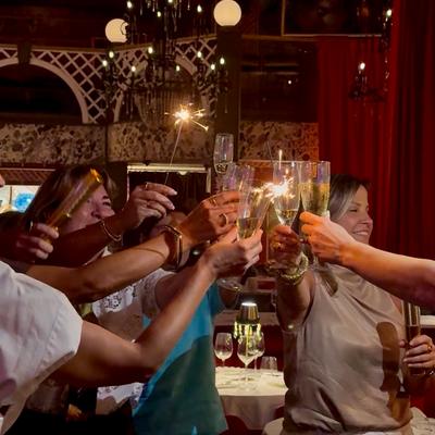 Ladies night celebration with a toast.