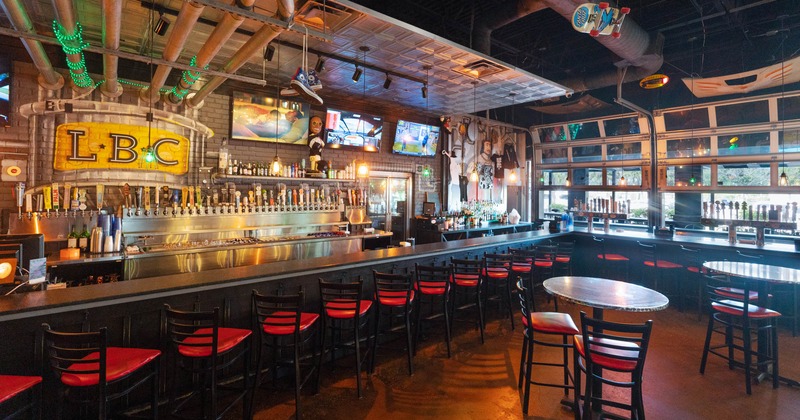 Interior, bar and chairs, tv's