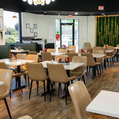 Interior, diner area, tables,chairs, wide view.