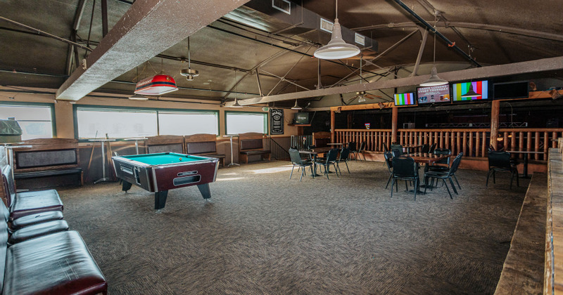 Interior, seating and TV area with a pool table