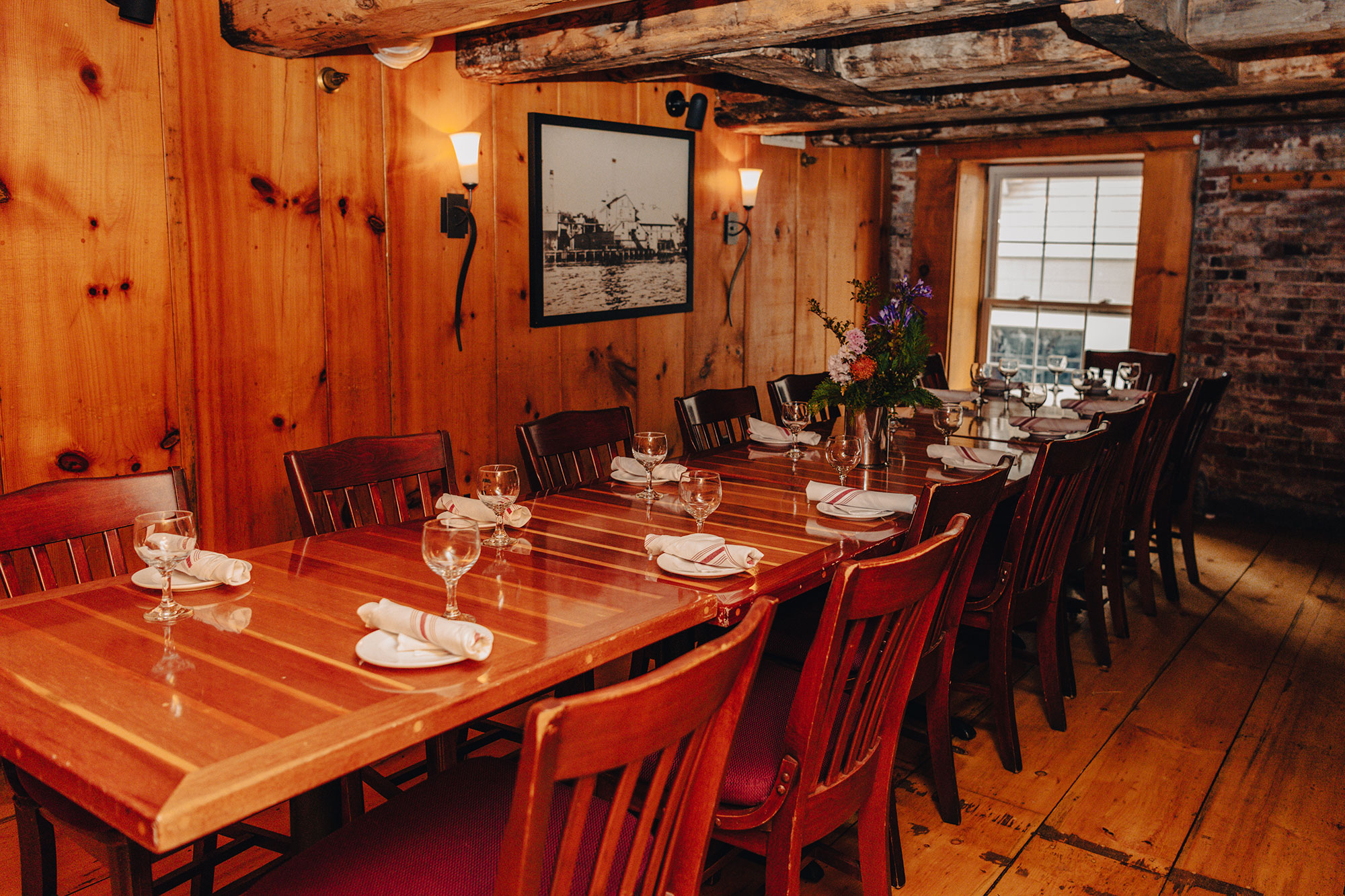 Interior, seating area, tables ready for guests.