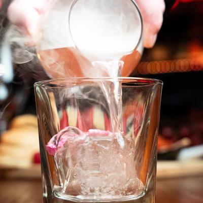 A cocktail being served.