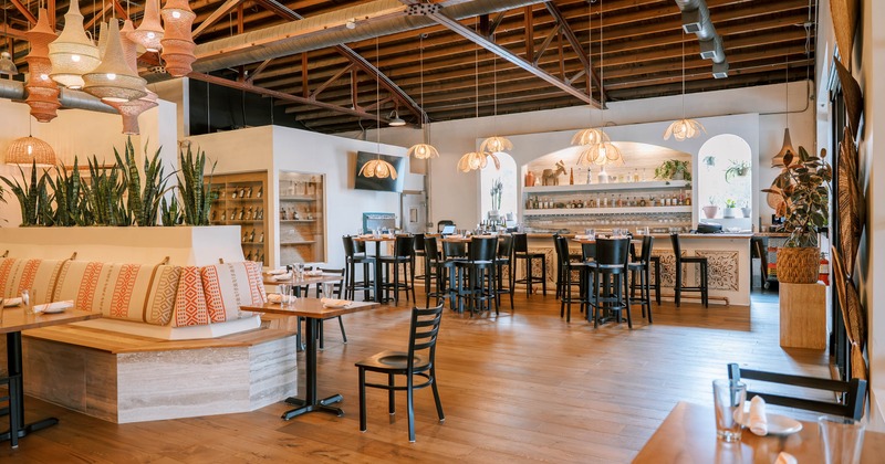 Interior, seating area with a bar in the back