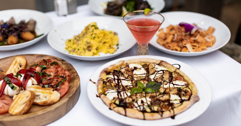 Assorted dishes and Margarita cocktail