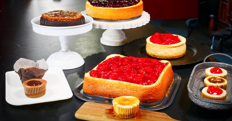 Whole cheesecakes displayed on the table