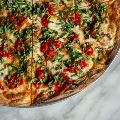 Pizza cut in slices.