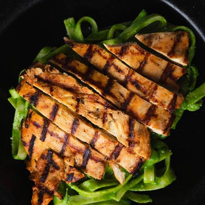 Served chicken pasta in the plate.