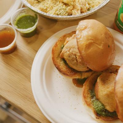 Two burgers, dip on the side