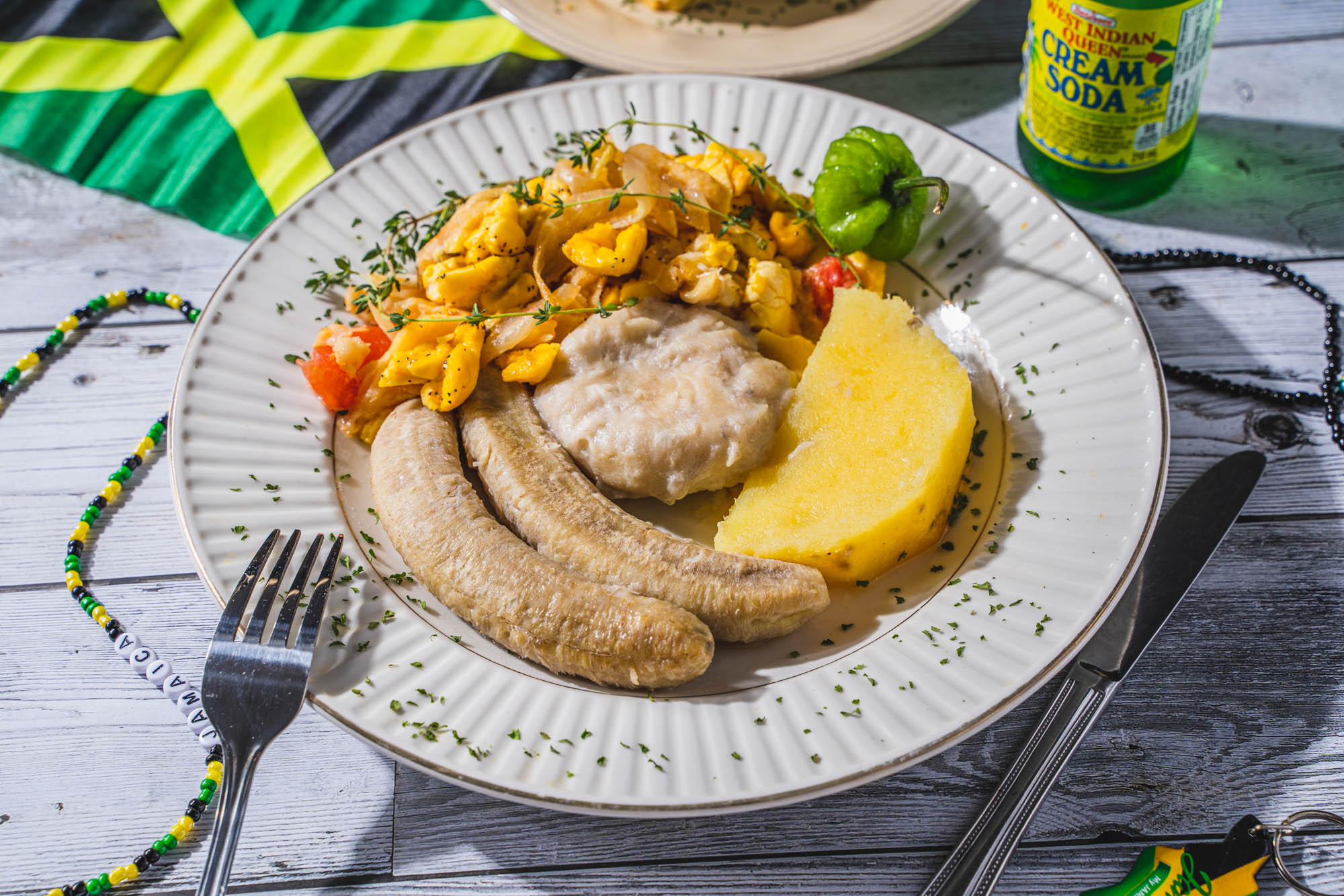 Saltfish, with bananas, pineapple and mixed vegetables