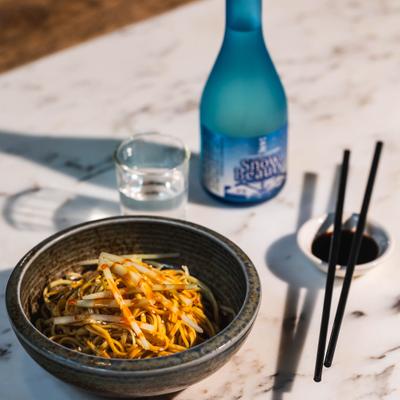 Sesame Cold Noodle bowl paired with sake.