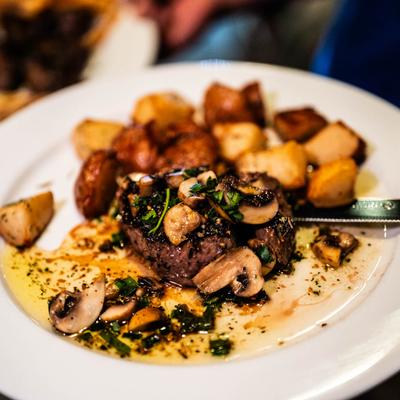 Steak de burgo  served with roasted potatoes.