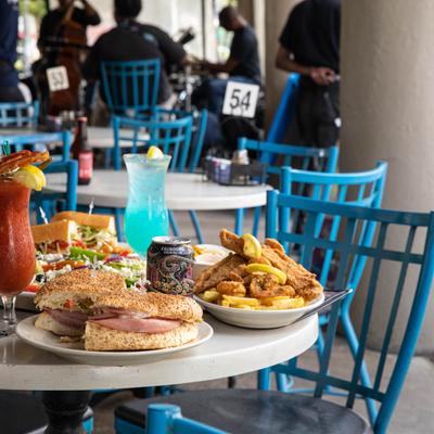 Interior, a table with served food and cocktails