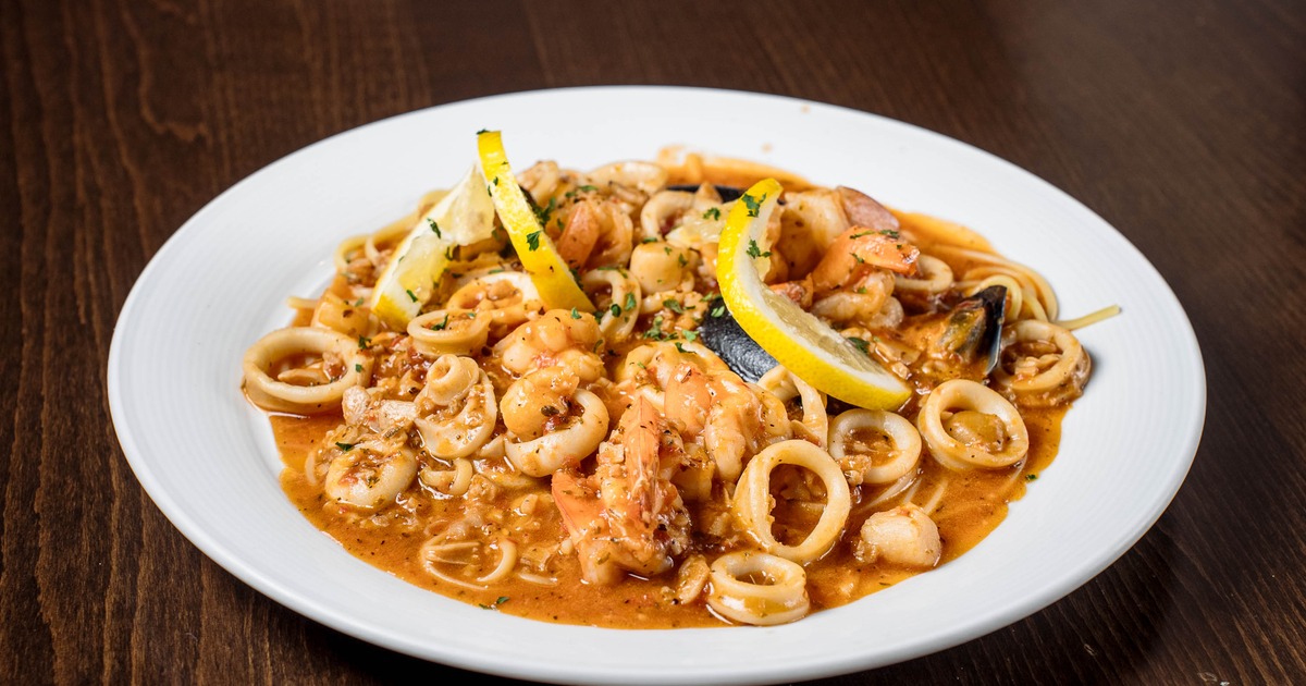 Mixed seafood pasta in tomato sauce