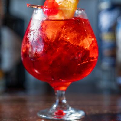 Red cocktail drink.
