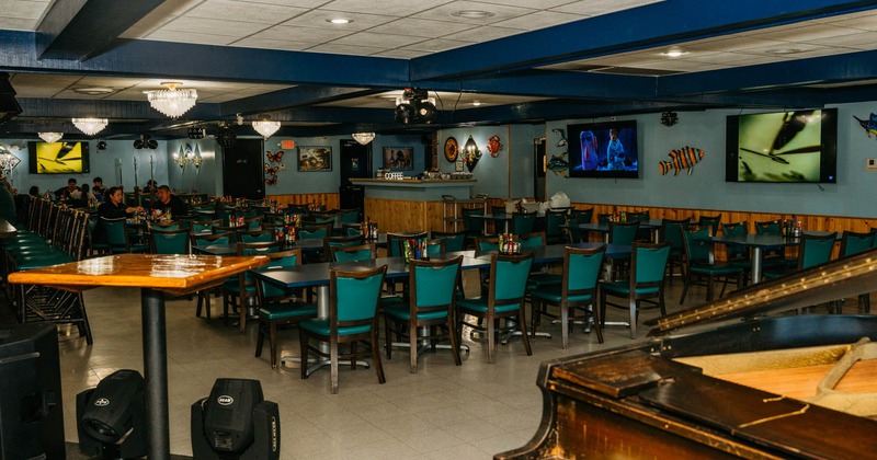 Interior, wide view, dining area, tables and chairs