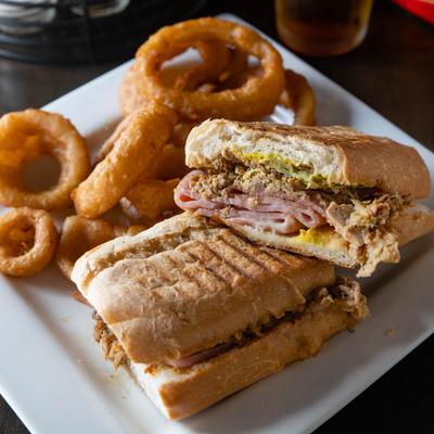 Classic Reuben sandwich with side onion rings