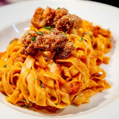 Tagliatelle with a Bolognese sauce.