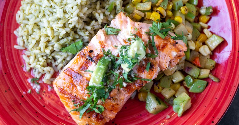 Grilled salmon with cilantro rice and chayote succotash