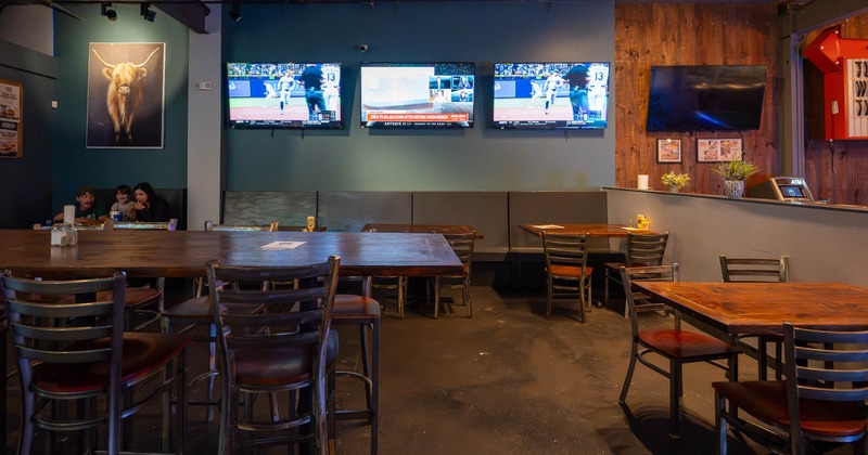 Interior, tables and chairs in dining area