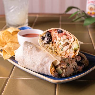 Cali Style Chicken Burrito, with beans, rice, cheese, avocado, pico, and cilantro lime cream.