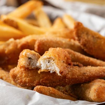 Smelt Basket with fries, close-up.