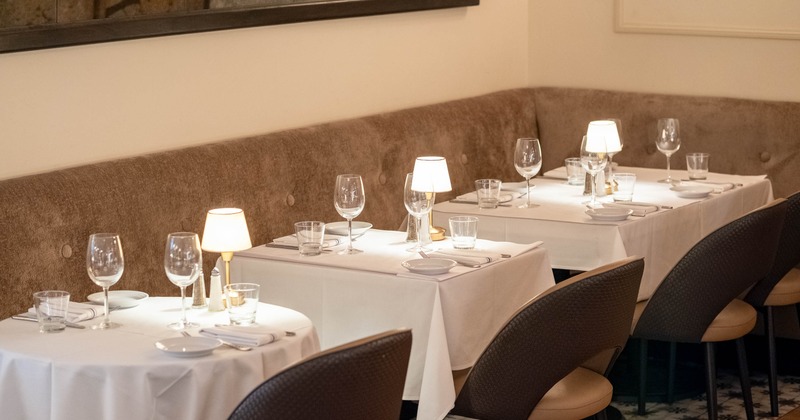 Interior, tables set for guest near wall