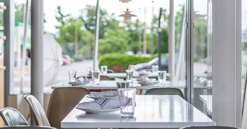 Table for two, with cutlery and glasses