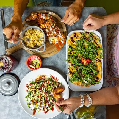 Overhead view of the table served with various meals.