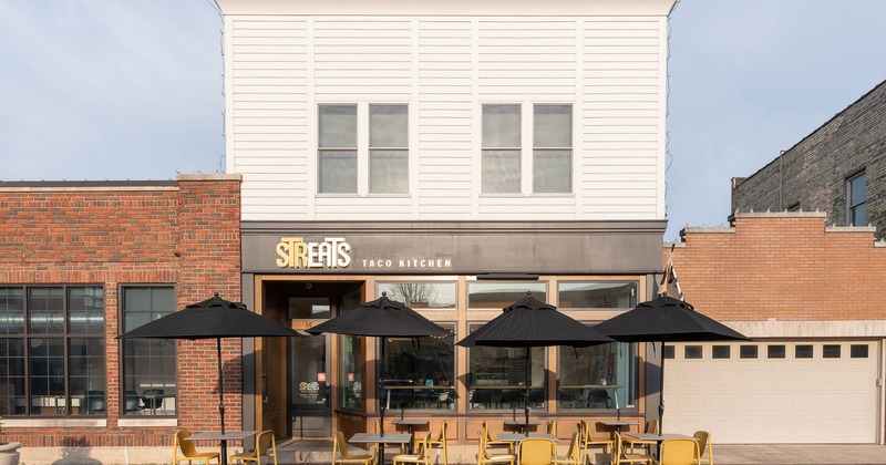 Exterior, tables and chairs in front of the restaurant