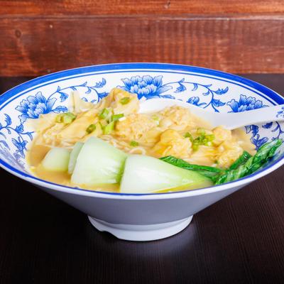 Wonton noodle soup with bok choy.