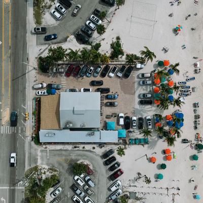 Birds eye view of the restaurant and parking lot.