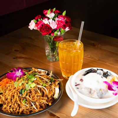 Pad Thai and Broccoli in Oyster Sauce with Logan Juice.