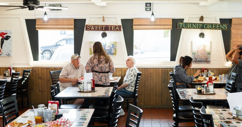 Interior, dining area, guests sitting