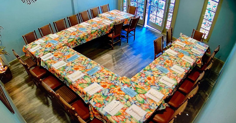 Tables for four ready for guests