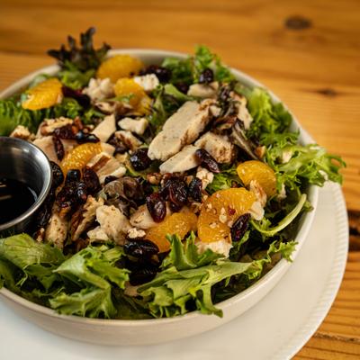 Hideaway signature salad bowl with dressing on the side.