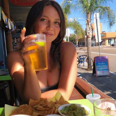 A guest with a glass of drink