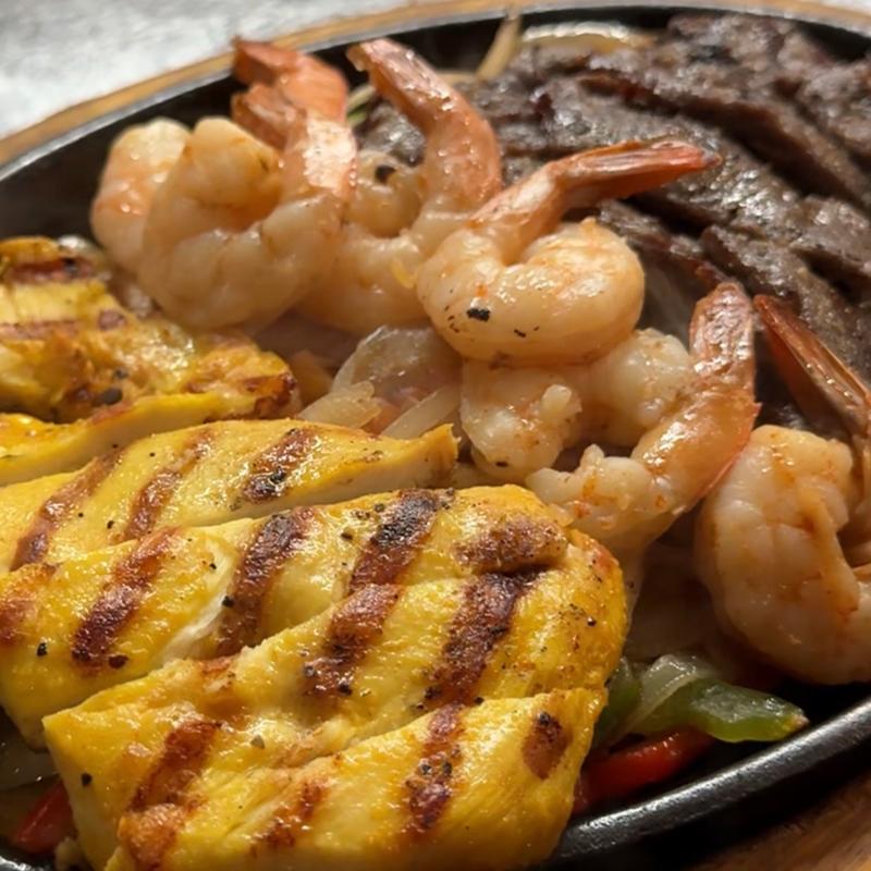 Fajita Trio Shrimp, Chicken, Carne Asada photo