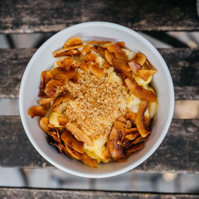 Mac n Cheese, topped with brown rice breadcrumbs, top view.