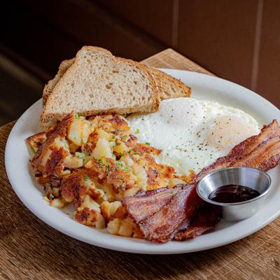 Egg Combo with potatoes, bacon, and toast.