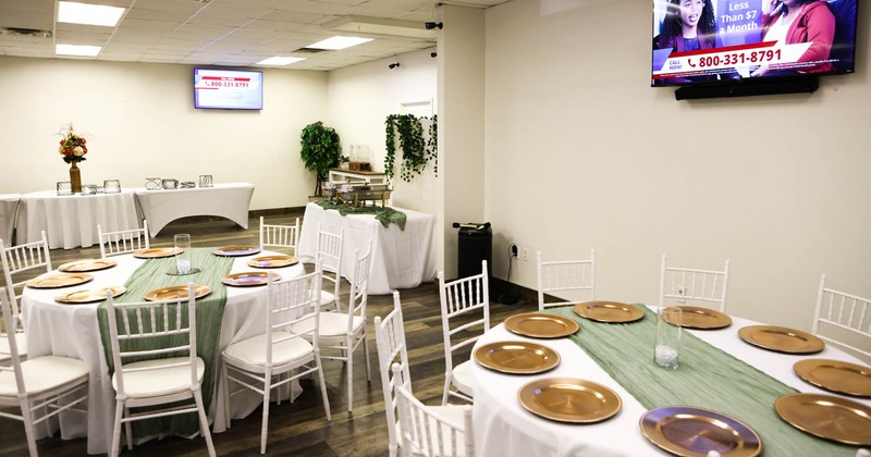 Interior, tables set for guests
