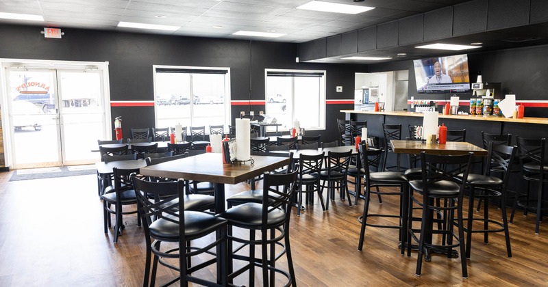 Interior, wooden tables and high chairs