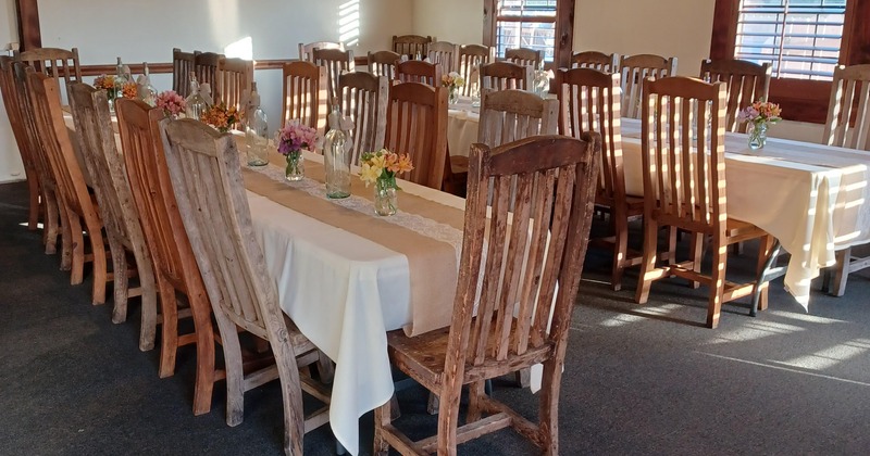Interior, tables  and seating, view of the playground with children playing