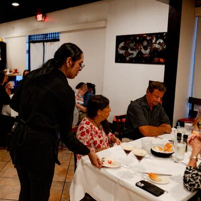 Employee serving customers.