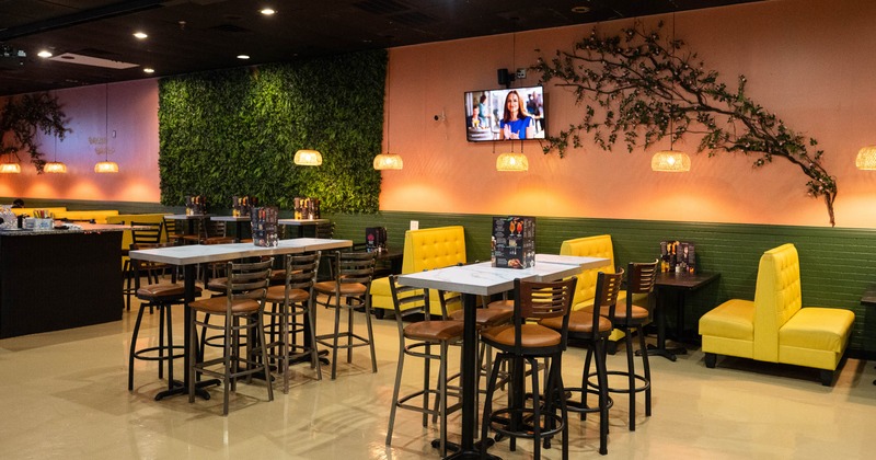 Interior, high tables and chairs in dining area